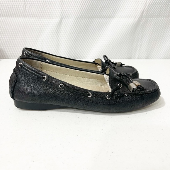 Michael Kors Amber Black pebbled tassel flats. - Picture 2 of 13
